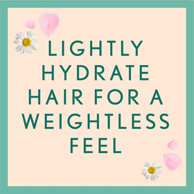 Aveeno Rosewater and Chamomile shampoo pour, soothing scalp care.