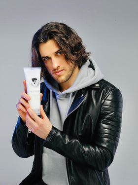 Frizz control and humidity resistance demonstrated on curls.