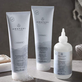 Awapuhi Wild Ginger HydraSoft texture-closeup conveys frizz-control and softness.