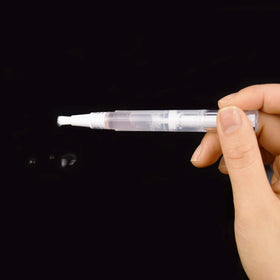 Awpeye brush applicator close-up for precise application.