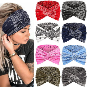 Awumbuk wide headband blue front view for secure all-day wear and coverage.