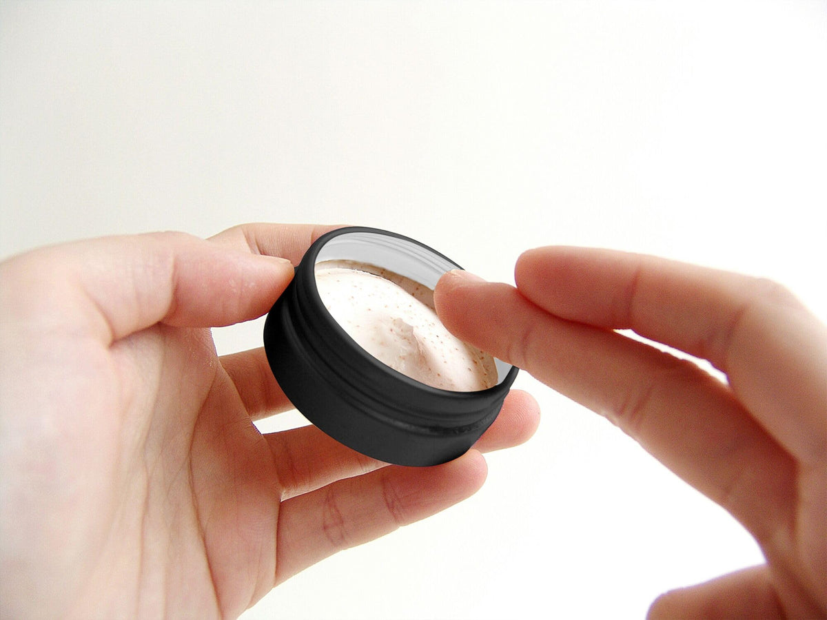 Axe Sickle versatile jar for lotions and creams on the go.
