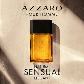 Azzaro Pour Homme bottle with engraved label, signaling luxury and timeless style.