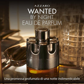 Azzaro Wanted by Night bottle close-up with cap, showcasing premium packaging for a luxury experience.