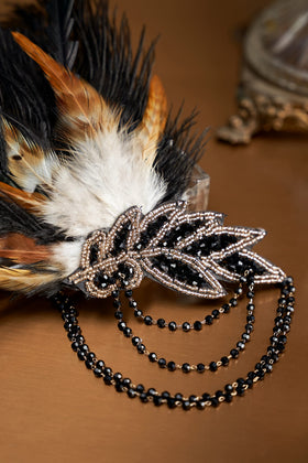 BABEYOND showgirl headband features black feathers for elegant stage-ready styling.