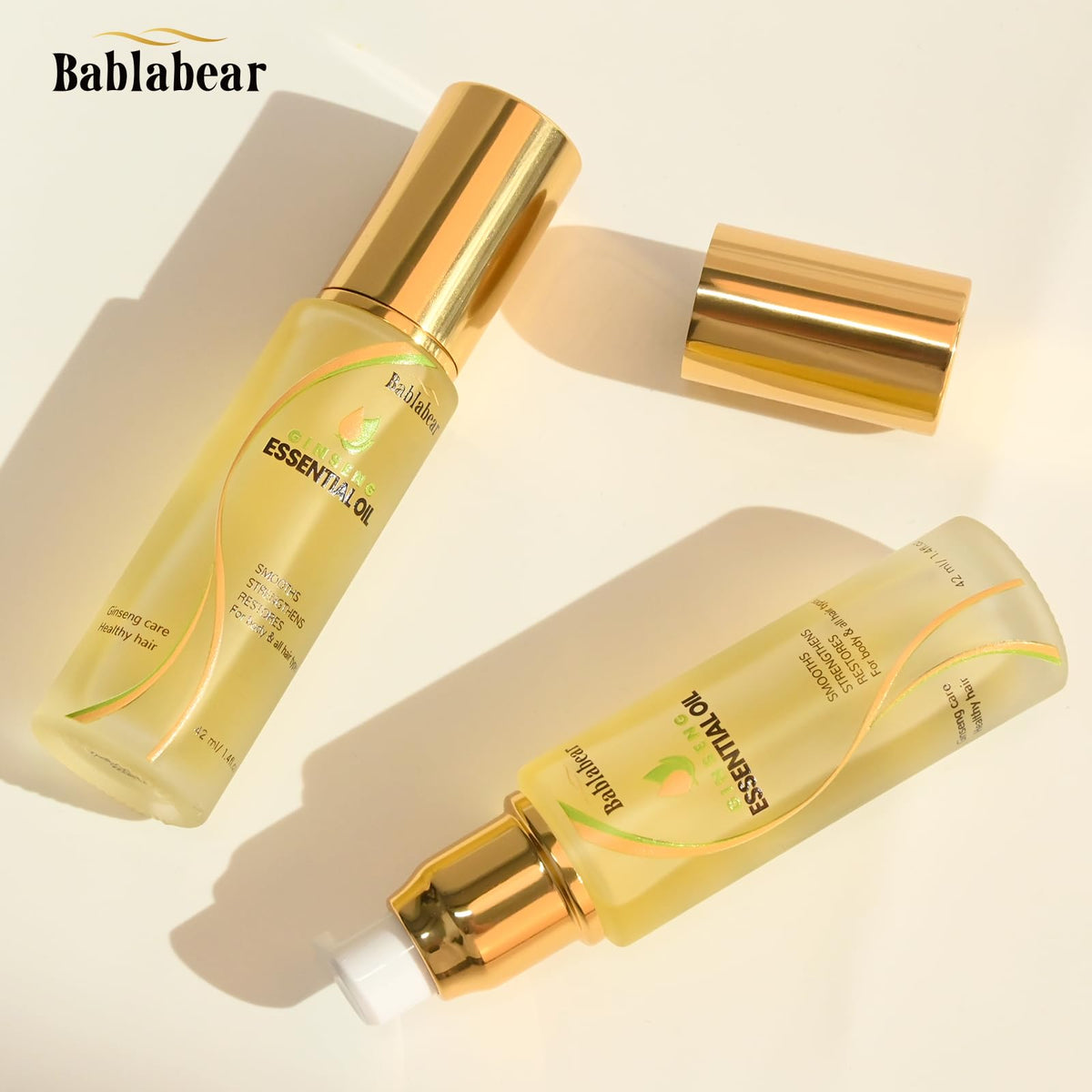 Bablabear Hair Oil pump dispense demonstrates easy daily application and precise dosing.