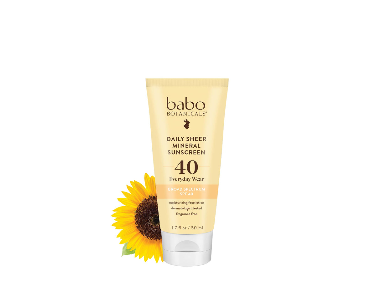 Babo Botanicals Daily Sheer SPF 40 bottle close-up, fragrance-free protection for sensitive skin.