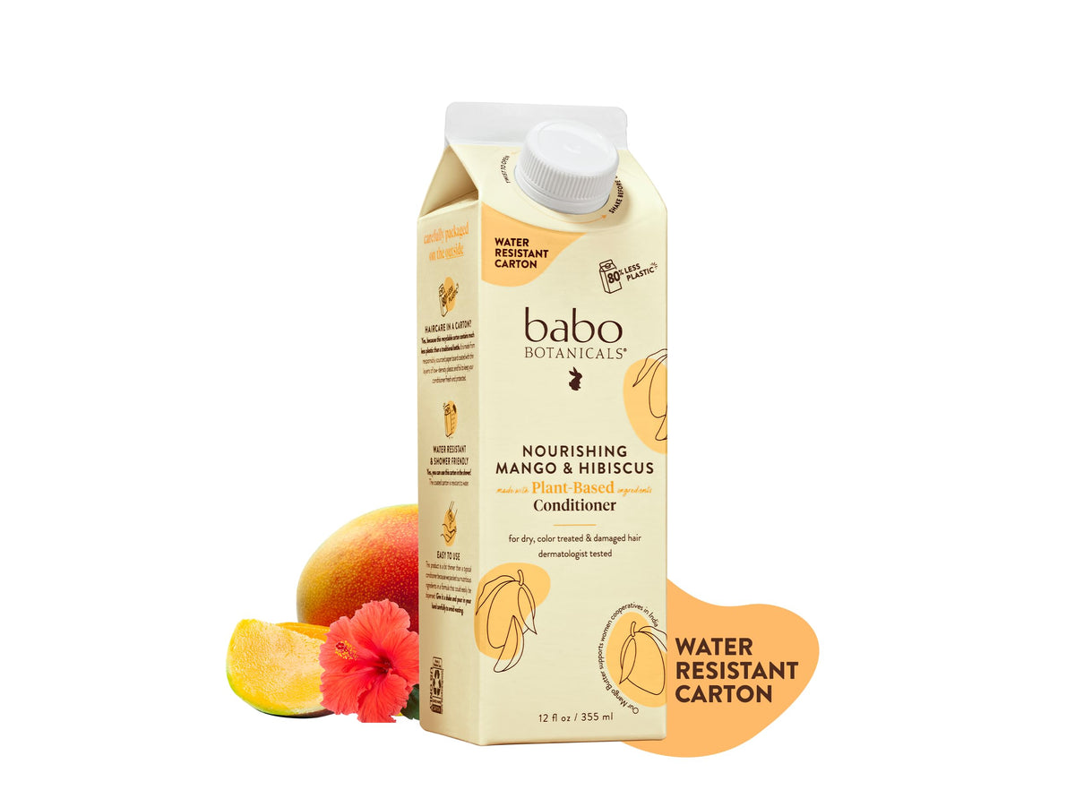 Babo Botanicals Mango & Hibiscus conditioner bottle emphasizes deep hydration for dry hair.