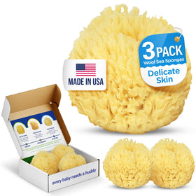 Baby Buddy natural bath sponge close-up shows ultra-soft sea wool for delicate skin.