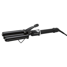 BaBylissPRO porcelain ceramic triple barrel waver in action for smooth, even waves.