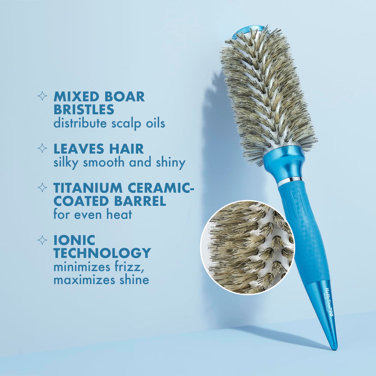 BaBylissPRO round brush smoothing thick textured hair for glossy finish.