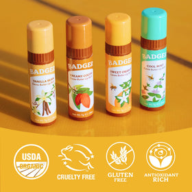 Badger lip balm with orange essential oils and citrus scent.