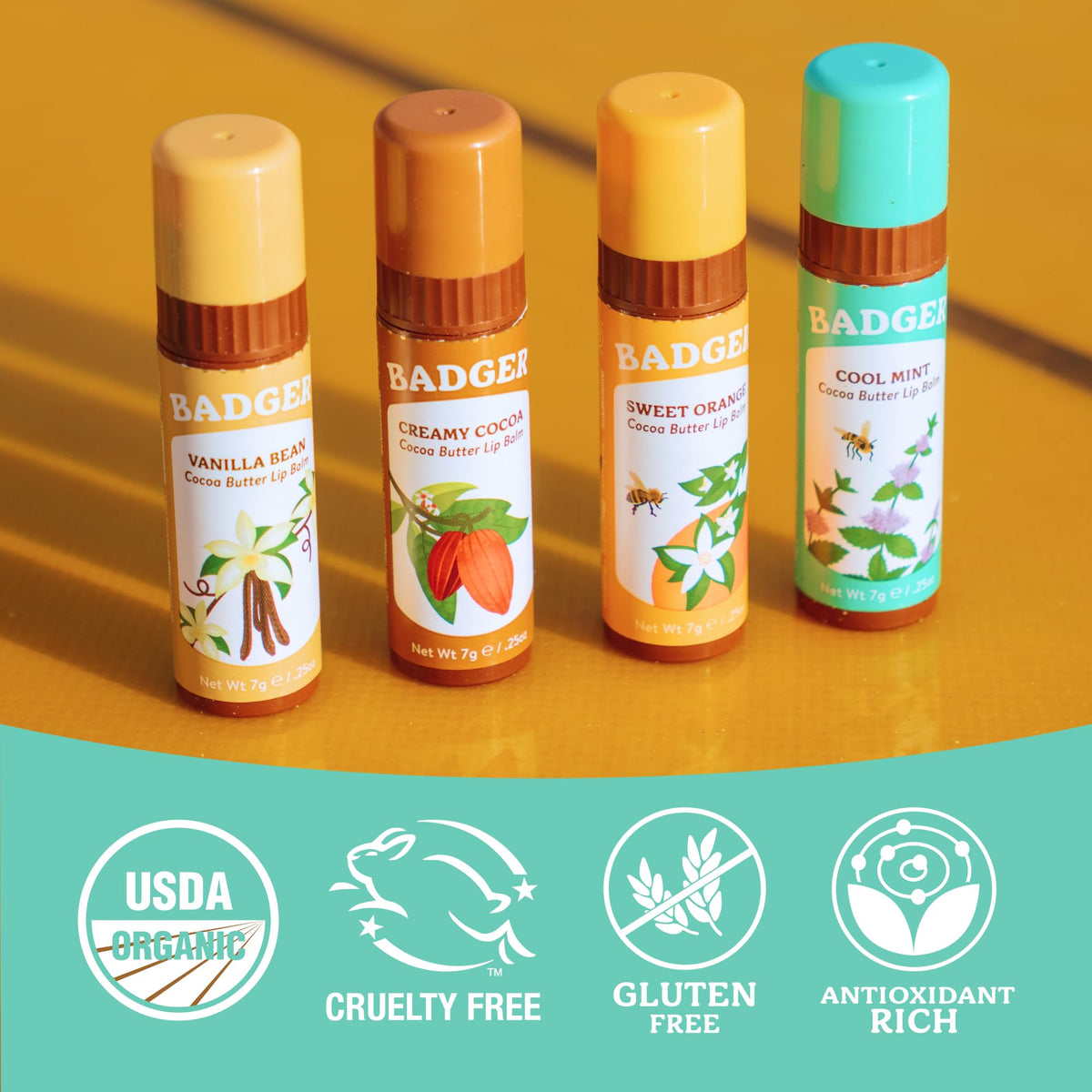 Badger organic cocoa butter olive oil beeswax closeup highlights natural ingredients