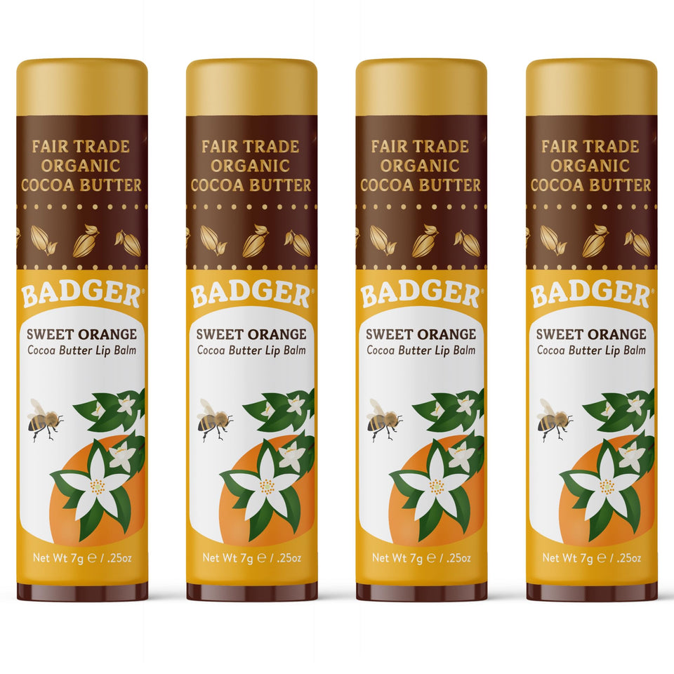 Badger Sweet Orange Cocoa Butter Lip Balm in a twist-up tube for long-lasting hydration.