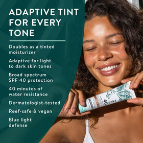 Badger tinted sunscreen on hand demonstrates easy, blendable coverage.