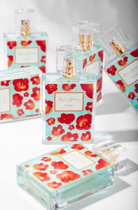 Badgley Mischka Poppy floral heart notes bloom.