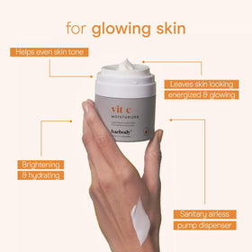 Baebody Vitamin C moisturizer bottle emphasizes jojoba oil for soothing hydration.