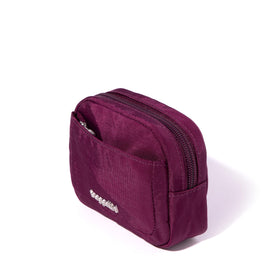 Baggallini mini cosmetic pocket on-the-go design enables easy touch-ups.