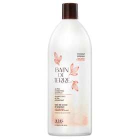 Bain de Terre Coconut Papaya Shampoo bottle displaying ultra-hydrating formula.