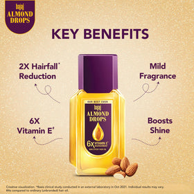 Bajaj Almond Drops hair oil application scene shows even distribution