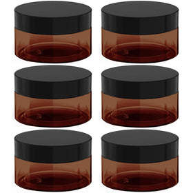 BallHull amber jar with lid protects cosmetics during travel.