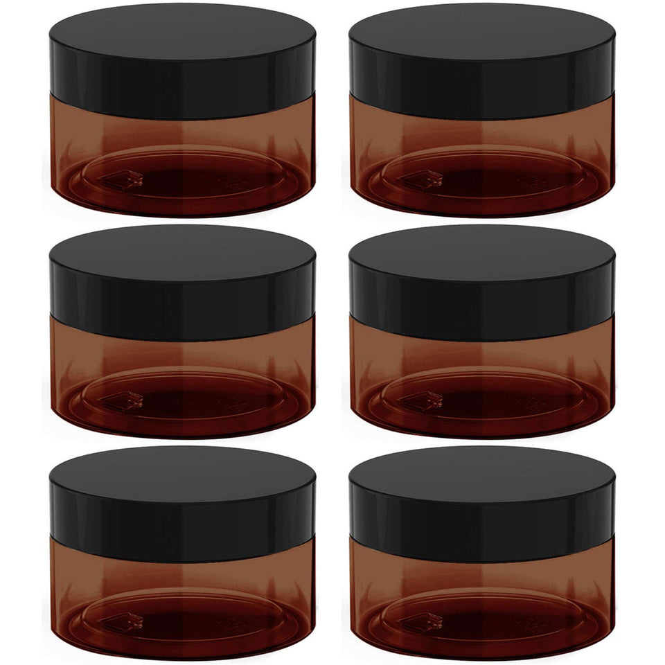 BallHull amber jar with lid protects cosmetics during travel.