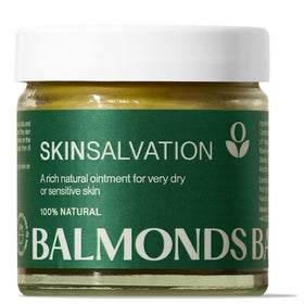 Balmonds Skin Salvation tub open showing rich balm texture for dry skin relief.