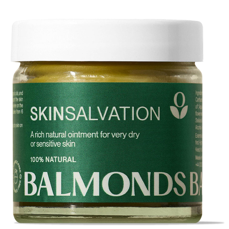 Balmonds Skin Salvation tub open showing rich balm texture for dry skin relief.