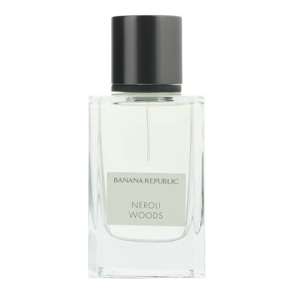 Banana Republic Neroli Woods bottle close-up with wood backdrop for evening wear