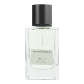 Banana Republic Neroli Woods bottle close-up with wood backdrop for evening wear