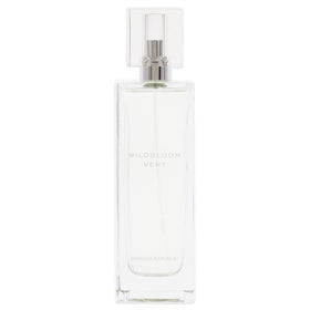 Banana Republic Wildbloom Vert bottle closeup highlights delicate petals and crisp pear notes.