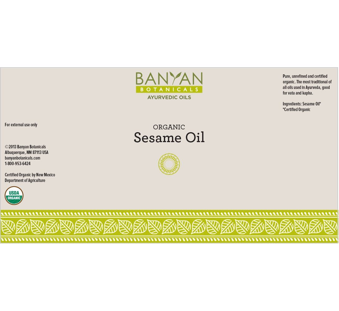 Banyan Botanicals abhyanga massage oil hands applying sesame oil for grounding routine.