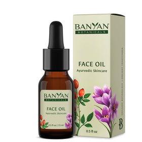 Banyan Botanicals Face Oil bottle with rosehip glow for nourished skin.