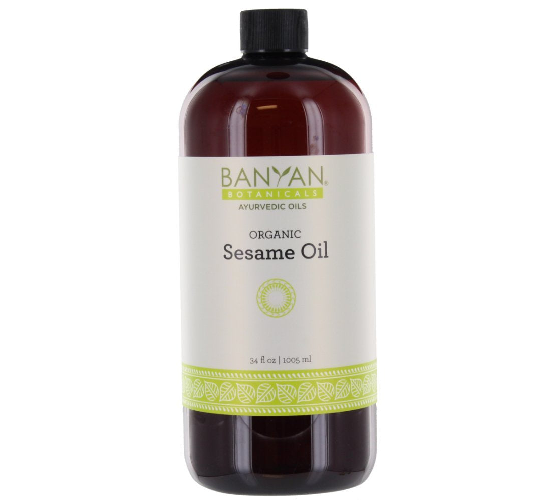 Banyan Botanicals Organic Unrefined Sesame Oil bottle for traditional abhyanga massage and grounding.