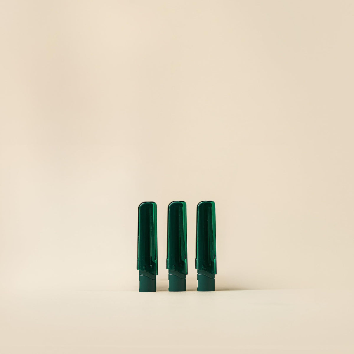 Close-up of Barefaced stainless steel blade refills for precise facial hair removal.