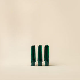 Close-up of Barefaced stainless steel blade refills for precise facial hair removal.