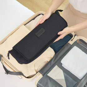 Barefoot Caribou interior includes two pockets, a zip pocket, and elastic bands.
