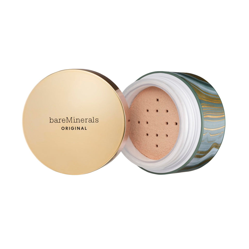 BareMinerals Deluxe Foundation bottle closeup shows natural coverage in fair lighting