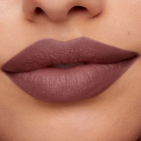 Applying bareMinerals Mineralist lip liner for precise definition