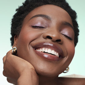 BareMinerals Mineralist Serenity Cranberry lip gloss-balm layered over lipstick for shine and dimension