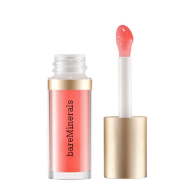bareMinerals Nourishing Lip Oil bottle close-up, displaying glossy shine and hydrated lips.