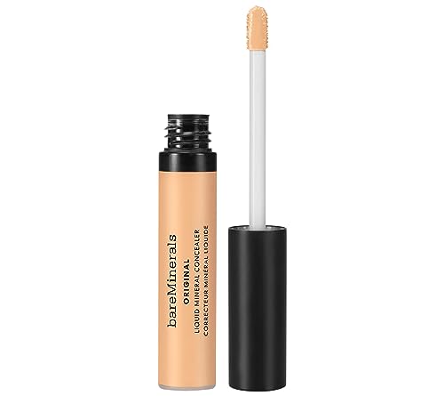 bareMinerals Original Liquid Mineral Concealer being applied under the eye to brighten and even skin tone.