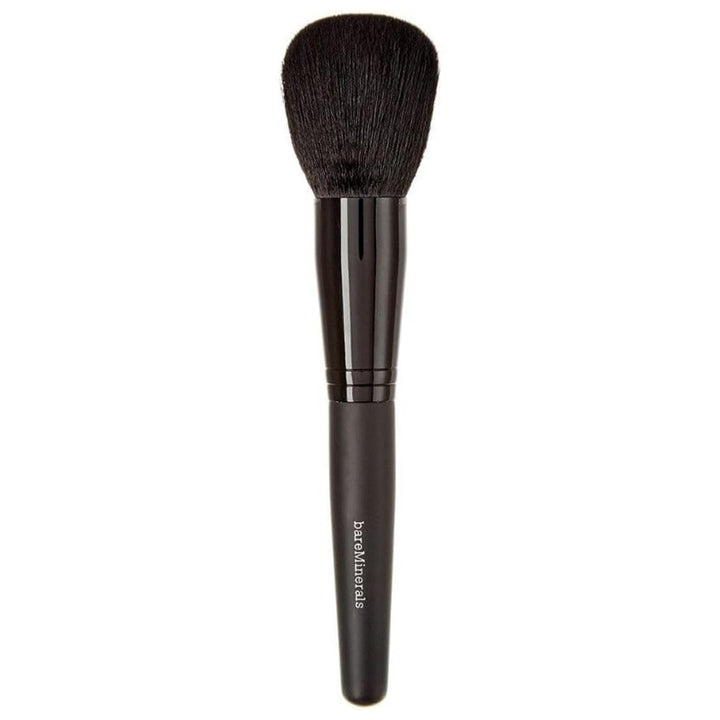 BareMinerals Supreme Finisher powder brush applying a sheer setting powder finish.