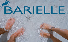 BARIELLE Total Foot Care Cream packaging on a vanity for daily foot care.