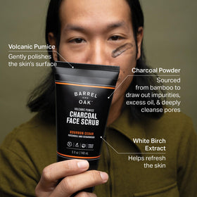 Barrel & Oak charcoal powder on face scrub demonstrates dirt absorption and pore cleansing.