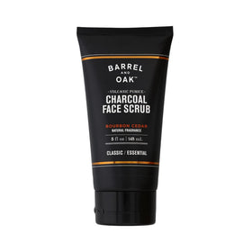 Barrel & Oak volcanic pumice and charcoal face scrub bottle highlights exfoliation power for smooth skin.