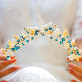 BARTOSI pearl accents on crown enhance bridal glow.