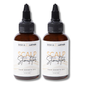 Bask and Lather Scalp Stimulator oil bottle for daily use promotes hair vitality.