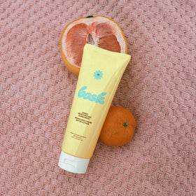 Reef-friendly Bask label indicates coral-safe sunscreen for beaches.