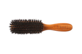 Bass semi oval boar wood brush bristles closeup show natural oil distribution for shine.